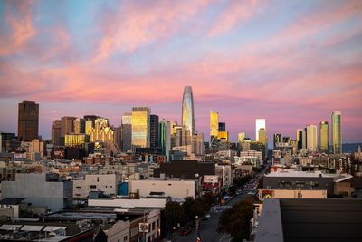Cityscape against sky during sunset