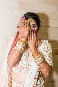 Midsection of woman wearing mask