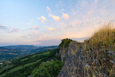 Scenic view of landscape against sky during sunset