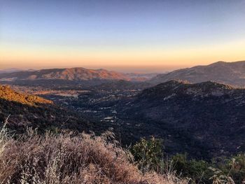 Scenic view of mountains at sunset