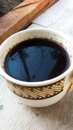 Close-up of coffee cup on table