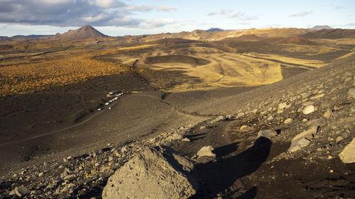 Aerial view of landscape and mountains against sky