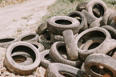 Close-up of abandoned tires at junkyard