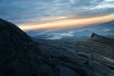 View of landscape against cloudy sky