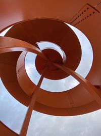 Low angle view of spiral staircase against sky