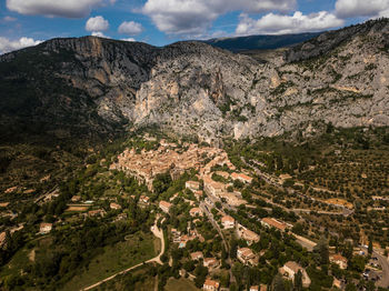 High angle view of trees and mountains against sky