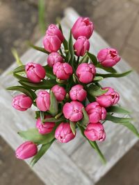 Close-up of pink roses on table