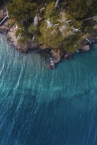 High angle view of rock formation in sea