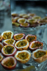 Close-up of fresh fruits in glass bowl during buffet at restaurant