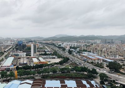 High angle view of buildings against sky