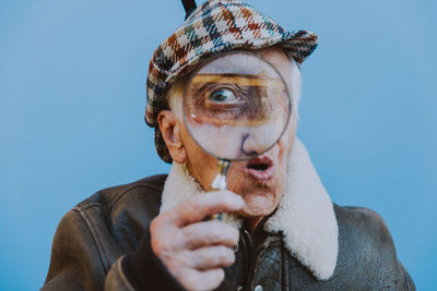 Portrait of man against white background