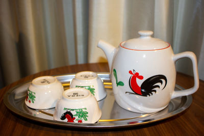 Close-up of tea cup on table