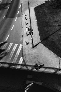 High angle view of man on bicycle in city