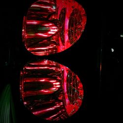 Close-up of red light at night