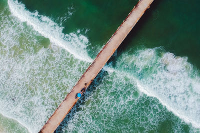 High angle view of water splashing in sea