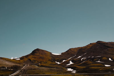 Scenic view of mountains against clear sky