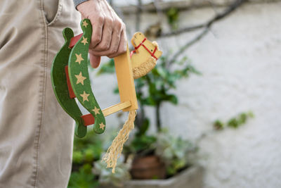 Close-up of person holding umbrella