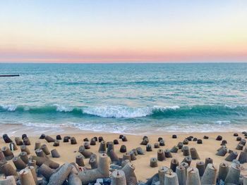 Scenic view of sea against clear sky during sunset