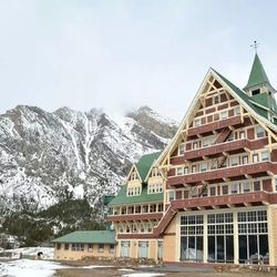 Houses on snow covered mountain