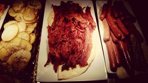 Close-up of meat on barbecue grill