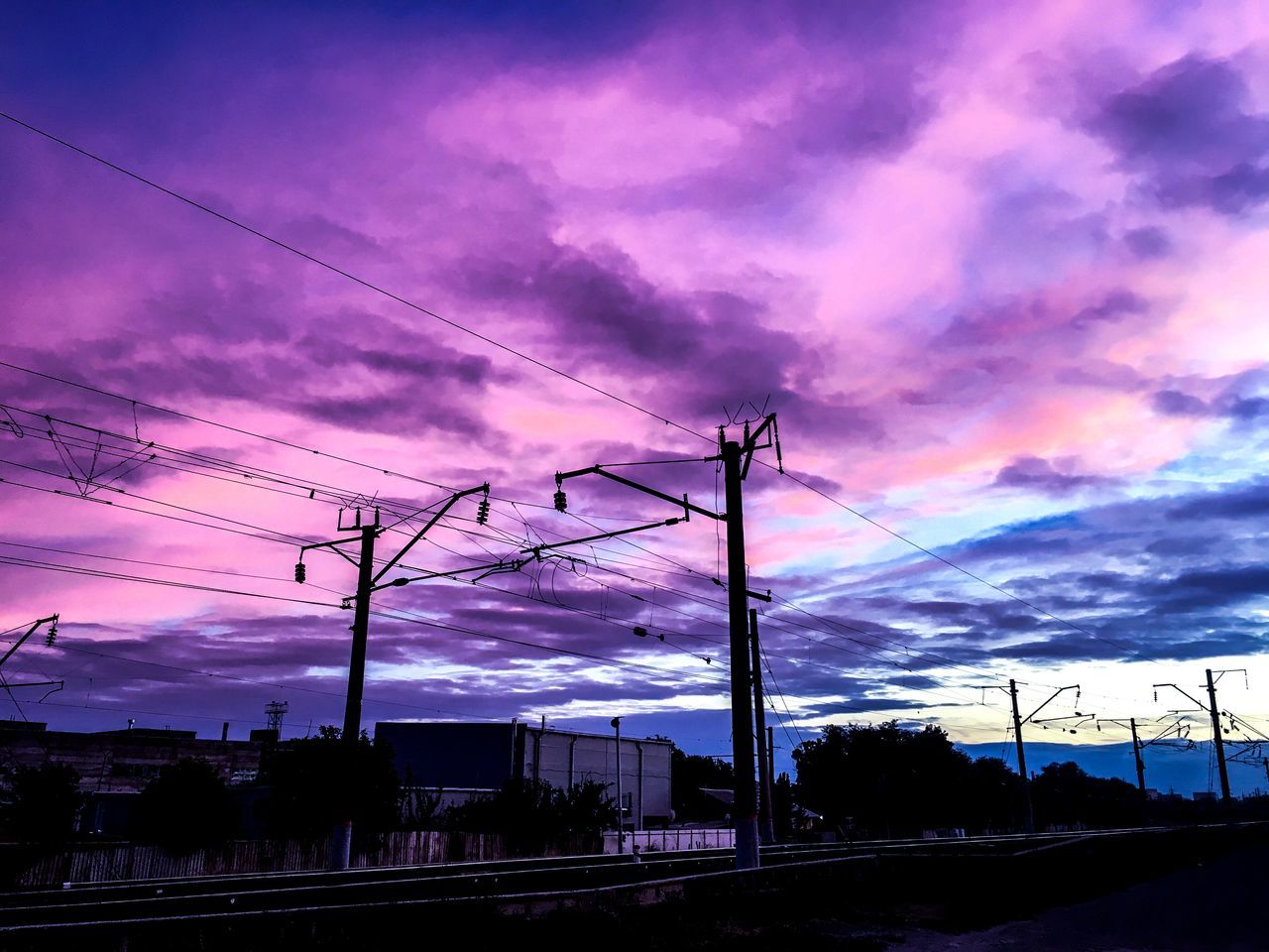 cloud - sky, sky, electricity, cable, power line, sunset, electricity pylon, technology, power supply, nature, connection, no people, fuel and power generation, silhouette, dramatic sky, dusk, low angle view, outdoors, beauty in nature, transportation