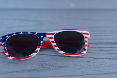 Close-up of sunglasses on table