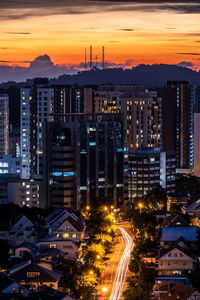 High angle view of illuminated buildings at night