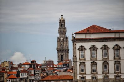 View of buildings in city against sky