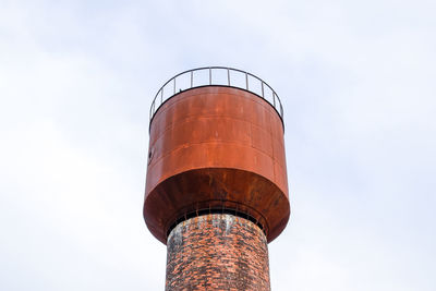 Low angle view of water tower against sky