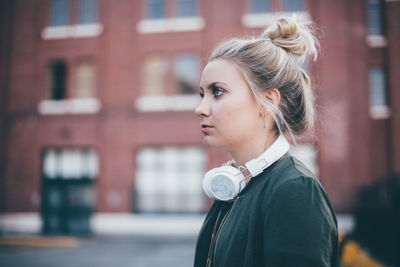 Side view of young woman