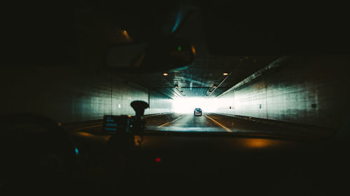 Driving through road tunnel 