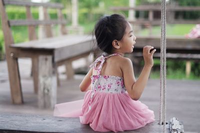 Cute girl sitting outdoor