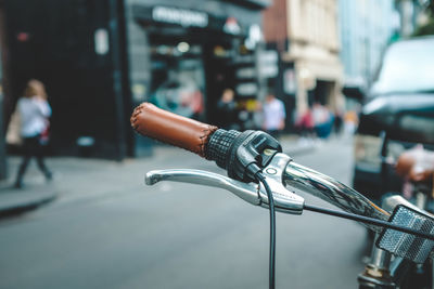 Close-up of bicycle on street