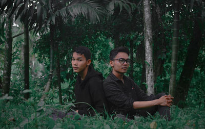 Portrait of young couple in forest