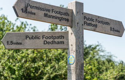 Information sign against trees