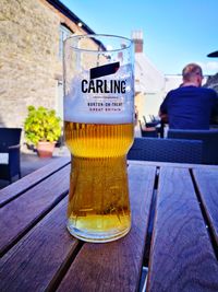 Close-up of beer glass on table