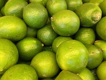 Full frame shot of limes in market