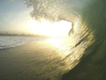 Scenic view of sea at sunset