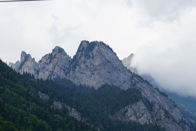 Scenic view of rocky mountains against sky