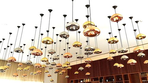 Low angle view of lanterns hanging on ceiling