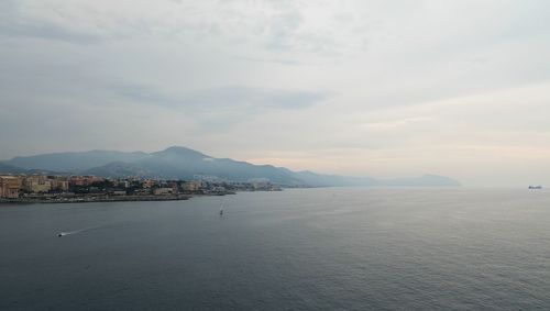 Scenic view of sea against cloudy sky