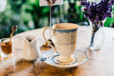 Close-up of coffee cup on table