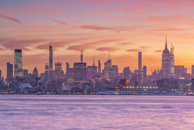 View of buildings against sky during sunset