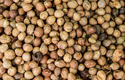 Full frame shot of nuts for sale at market