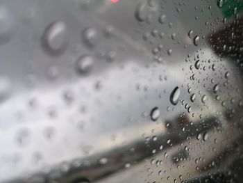 Full frame shot of raindrops on glass window