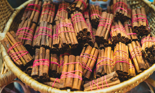 Full frame shot of cinnamon sticks in container