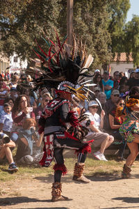 People in traditional clothing during festival