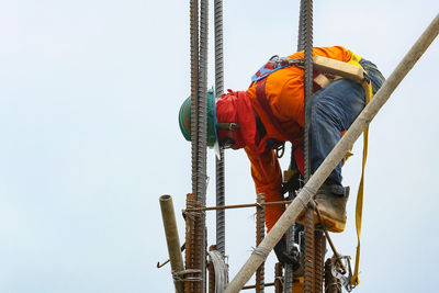 Low angle view of construction site against clear sky