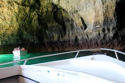 Scenic view of sea seen through cave