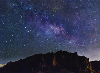 Low angle view of star field against sky at night